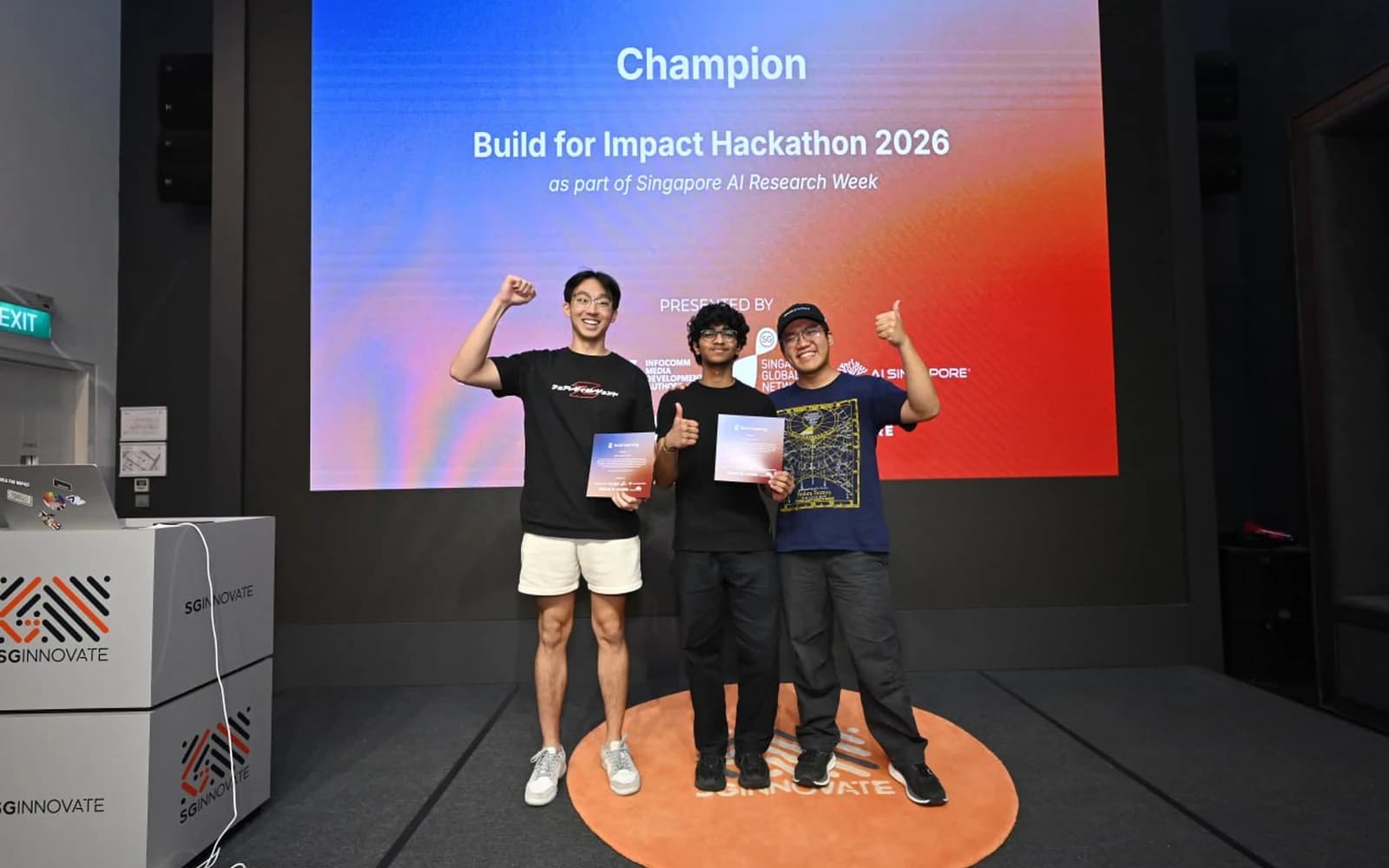 SpillTeaLeh team receiving the Build for Impact champion prize